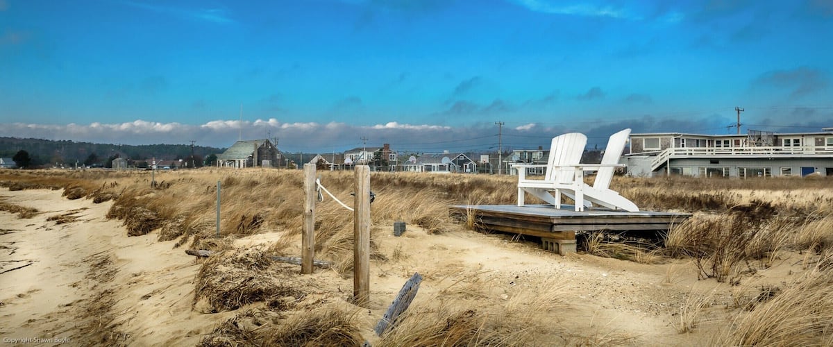 Those Adirondack chairs offer a great vantage point, viewing the commercial fishing vessels sailing in and out of Wellfleet Harbor.