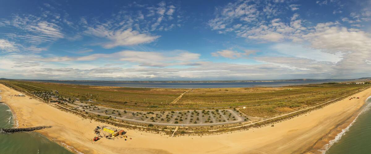 Aerial panoramic of the 3 dykes beach in Sète, in Hérault in Occitania, France