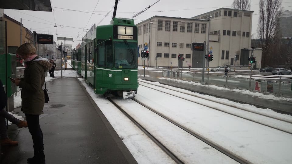 A tram station in Basel covered in snow