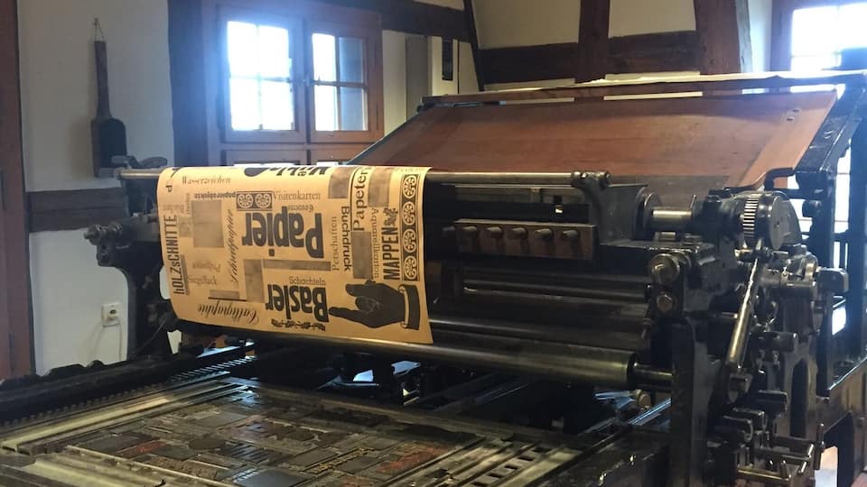 The Basel Paper Museum.
A fantastic way to spend an afternoon in Basel. Great for couples or families.
The museum walks you through the history of paper making, writing, printing and book making. You can make your own paper, try calligraphy, try marbling and use a typewriter and printer. The hosts at the museum speak English, French and German. There are people on hand to explain everything as you go.
There's a working waterwheel and the museum produces paper gifts for the shop. A must for anyone who loves stationary, craft, paperwork, graphics, printing and fonts.