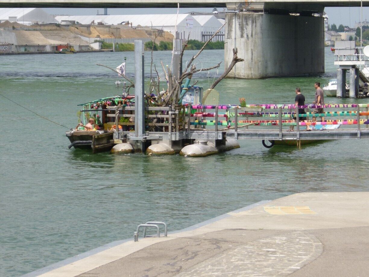 This the ferry that crosses the Rhine. Its covered in knitwork art which was the theme in town that time. The ferry moves through the current of the Rhine. The cable that is attached to it, makes sure there is control. After strolling around town for a while, taking the ferry is a nice change which doesn't cost much.