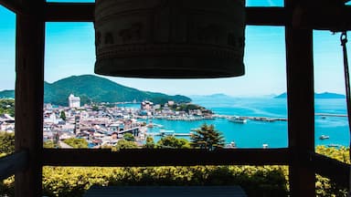 Tomonoura Port town and Seto Inland Sea landscape view from behind Io-ji or Ioji Temple bell. Fukuyama, Hiroshima Prefecture, Japan.