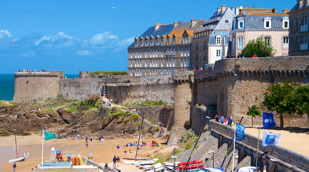 Ille-et-Vilaine featuring a sandy beach, a coastal town and heritage elements