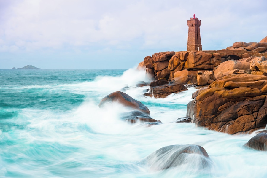 The famous lighthouse at the Cote de Granit rose in the surrounding of Ploumanach in Brittany/France.