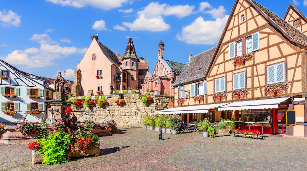 Eguisheim, France. Colorful half-timbered houses in Castle Square, Alsace.