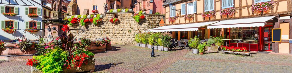 Eguisheim, France. Colorful half-timbered houses in Castle Square, Alsace.