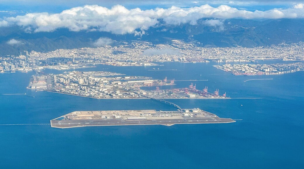 Aerial view of the Kansai International Airport (KIX) with izumisano city in background.