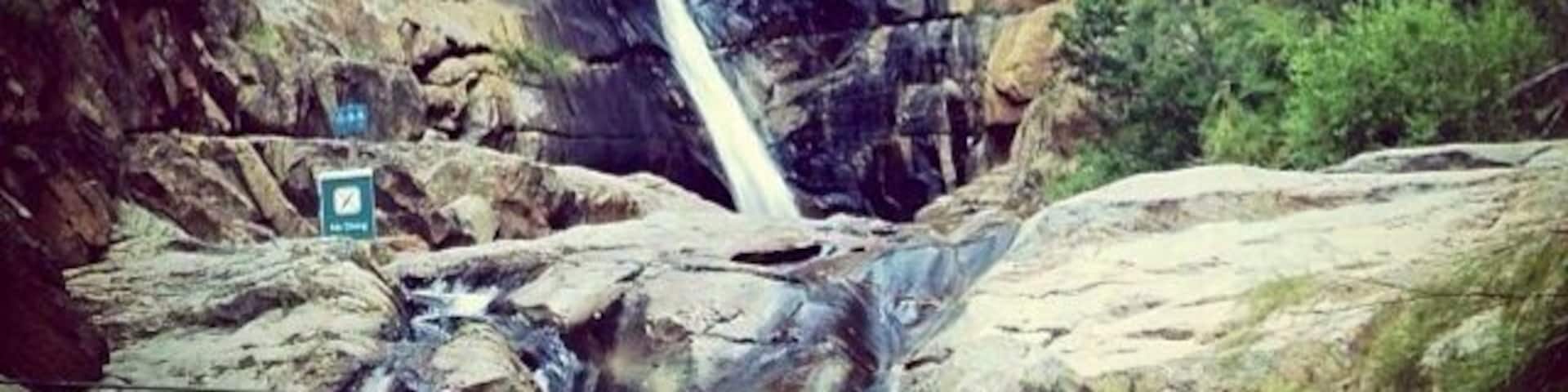 While traveling through the Klein Karoo be sure to stop at this #localgem for a refreshing swim.
This was one of our favorite waterfalls on our travels through South Africa. #roadtrip
The drive through the valley between De Rust and Prince Albert is absolutely beautiful.
The upper pool is deep enough that you can plunge into the chilly waters with no worries.
You can also slide carefully down the smaller waterfall into the lower shallow pool.