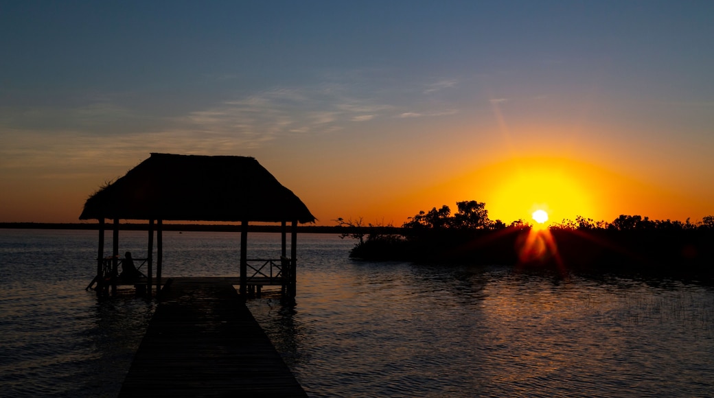 beautiful sunrise, meditation in the lagoon of the seven colors, in Bacalar, Quintana Roo, Mexico.