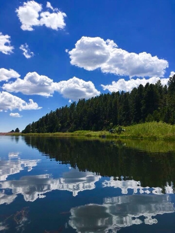 One beautiful afternoon, perfect day for kayaking on the mirror like lake nearby.