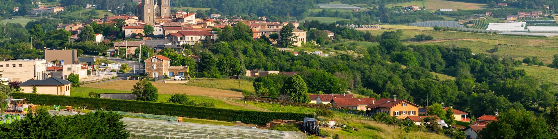Village of Chabanière and its 19th century Saint-Didier church, in the Monts du Lyonnais, in Auvergne-Rhône-Alpes, France