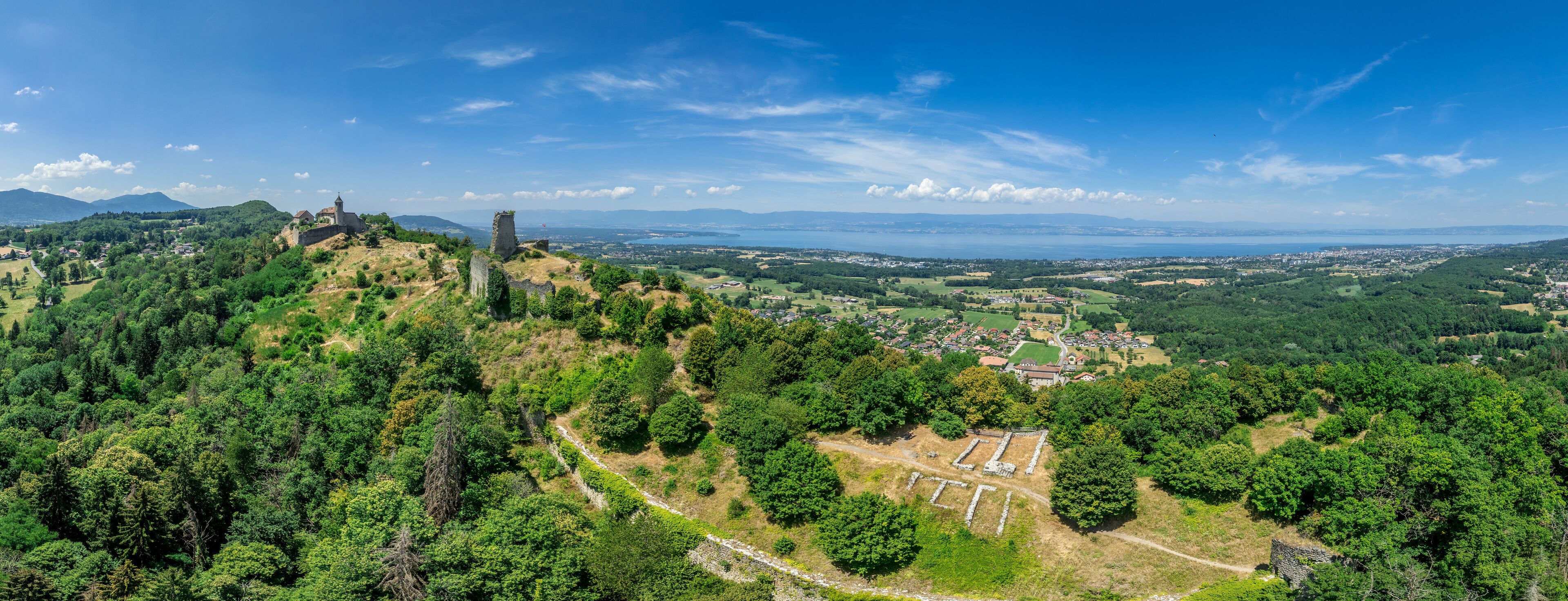 Aerial view of Allinges castle a medieval ruin and a castle with bastions on the hill above the Lake Geneva in France
