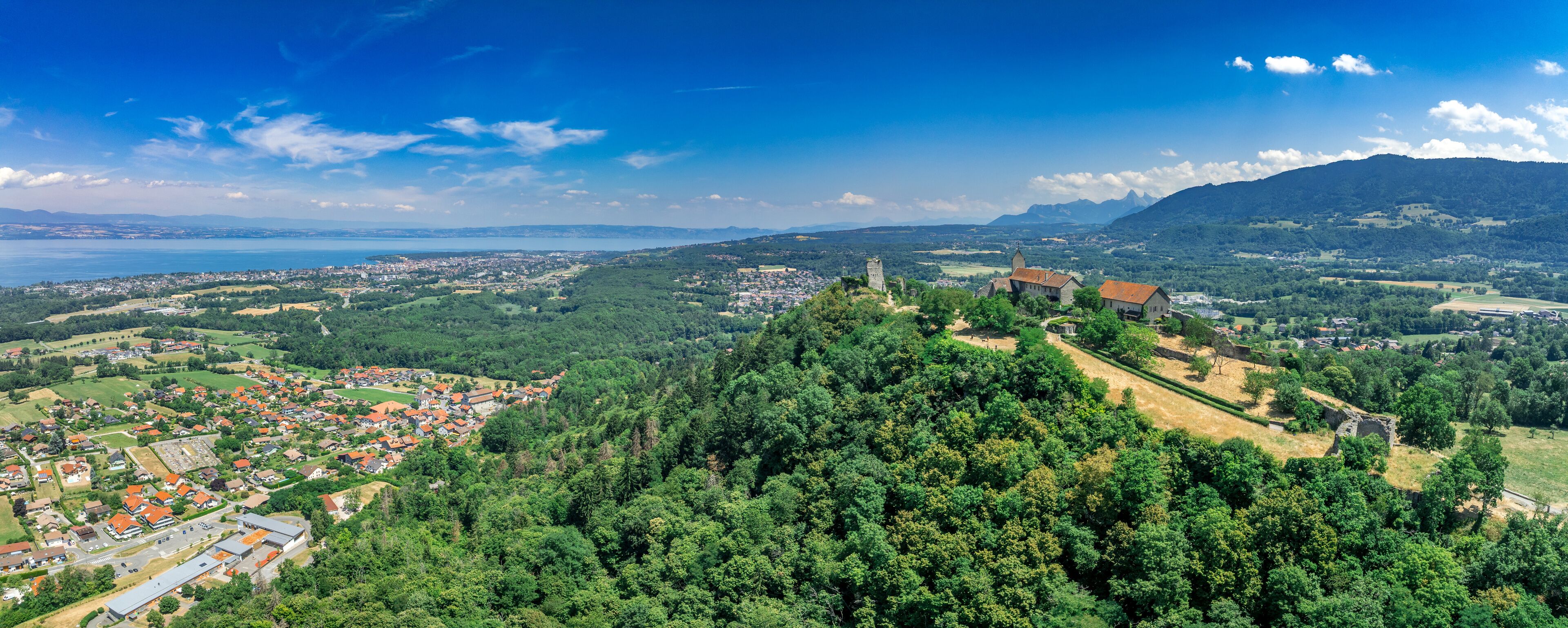 Aerial view of Allinges castle a medieval ruin and a castle with bastions on the hill above the Lake Geneva in France