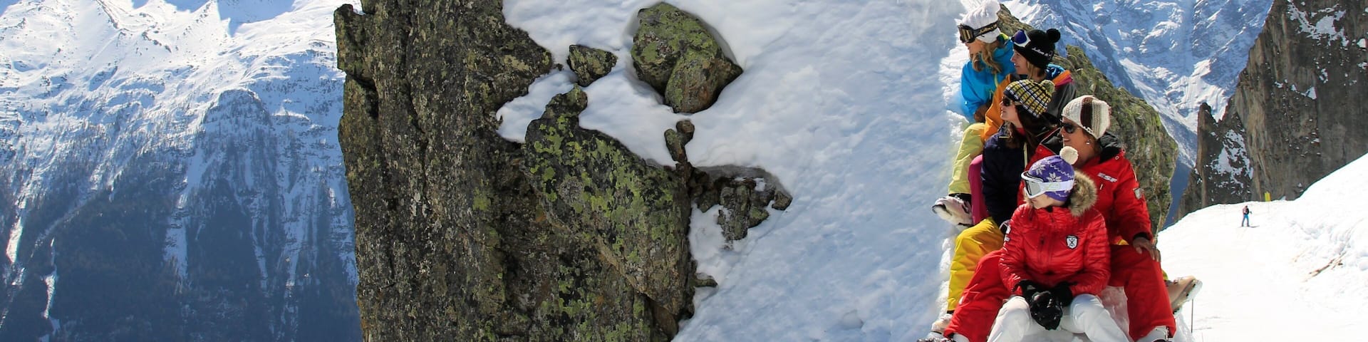 Chamonix-Mont-Blanc showing snow and mountains as well as a small group of people