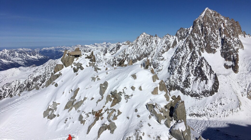 Enjoying a high-altitude picnic at Petite Aguille Vert. Take the cable car up the mountain and walk up the mountain through the snow (with strong boots!) #LifeAtExpedia