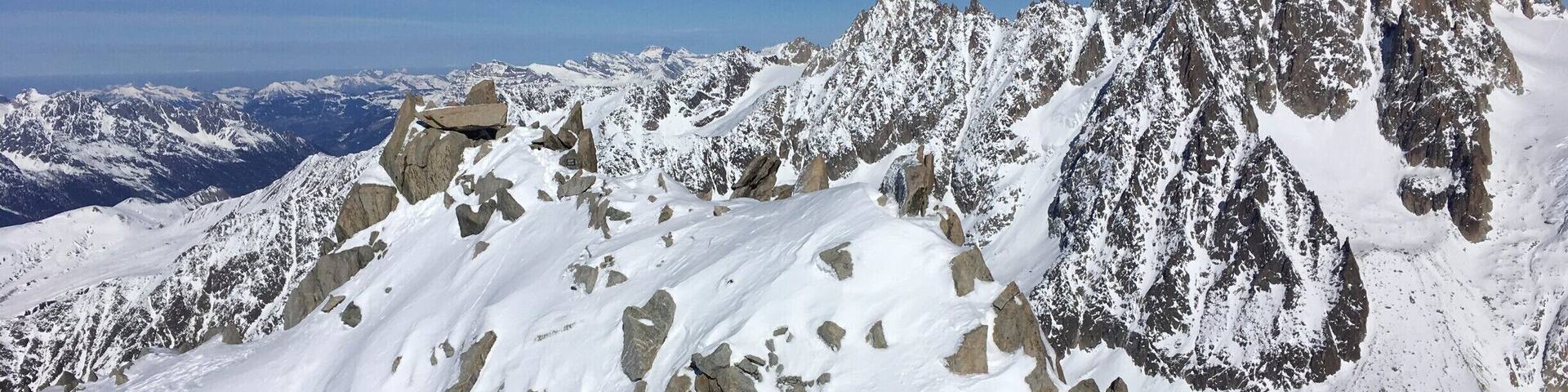 Enjoying a high-altitude picnic at Petite Aguille Vert. Take the cable car up the mountain and walk up the mountain through the snow (with strong boots!) #LifeAtExpedia