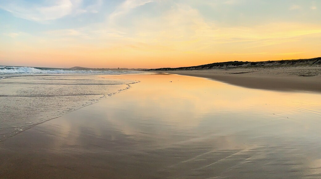 Beautiful sunset on the private and empty beach at The Pullman Magenta in Central Coast, NSW