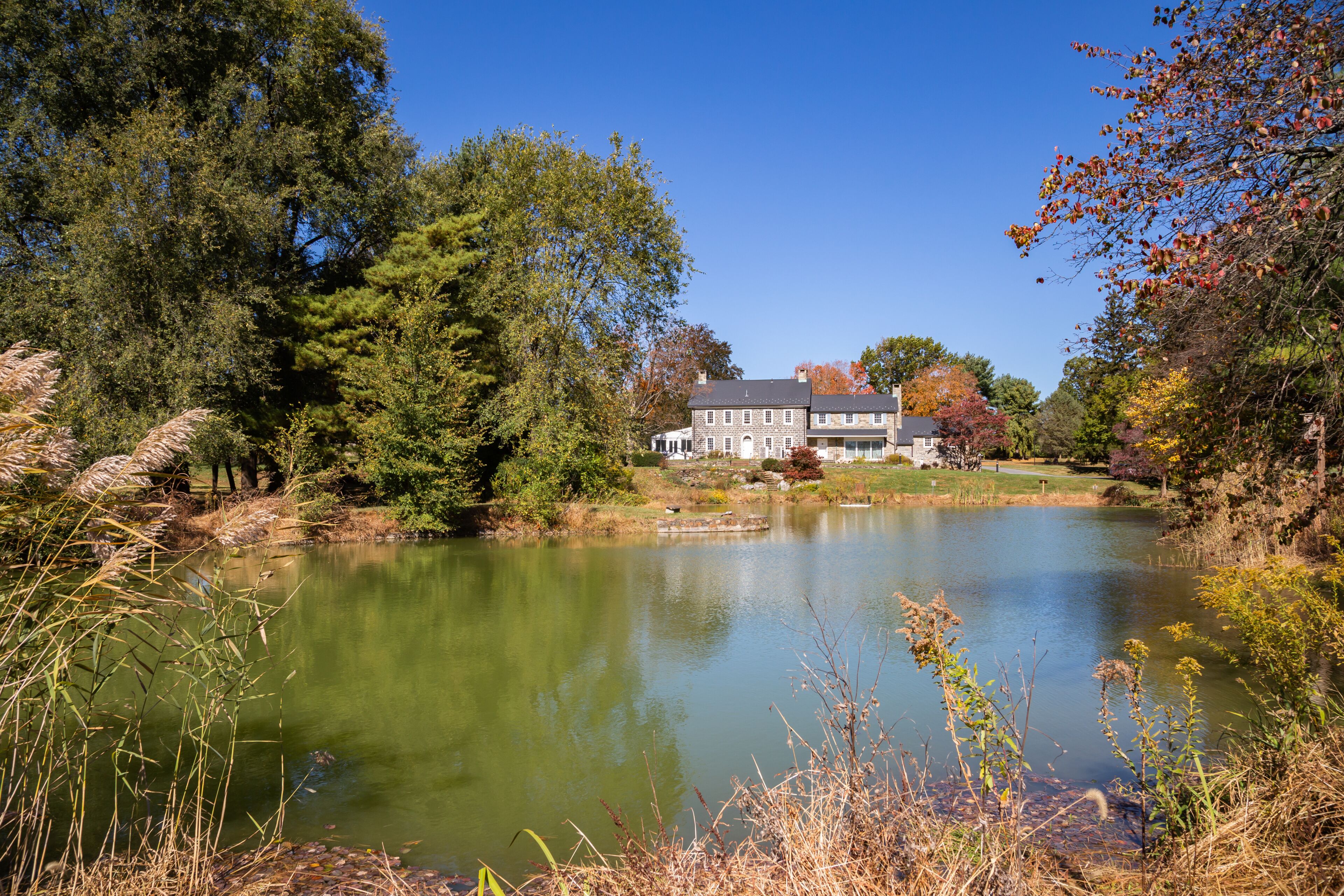 The old farmhouse at Louise Moore public park in Easton, Pennsylvania is used for office purposes, specifically the Farmland Preservation Office.