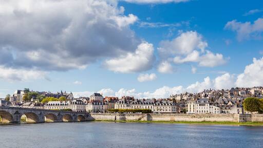 Cityscape Blois with the Cathedral of St. Lois and ancient stone bridge over Loire river, Loir-et-Cher in France
