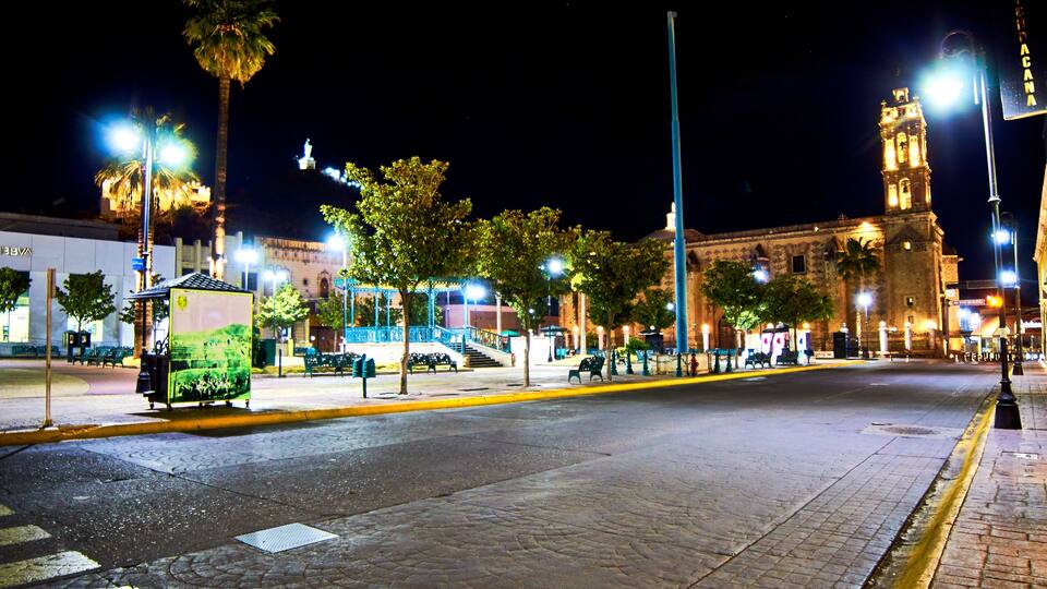 downtown at night with church in the background and alone street, in hidalgo del parral chihuahua