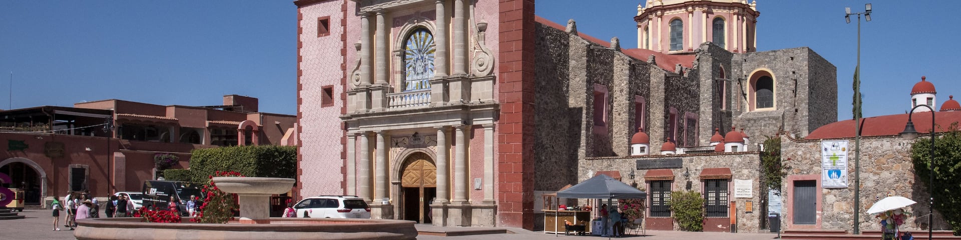 A historic church with a bell tower and a dome.