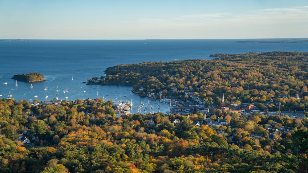 Camden, Maine coastal town on Atlantic Ocean during sunset in Autumn