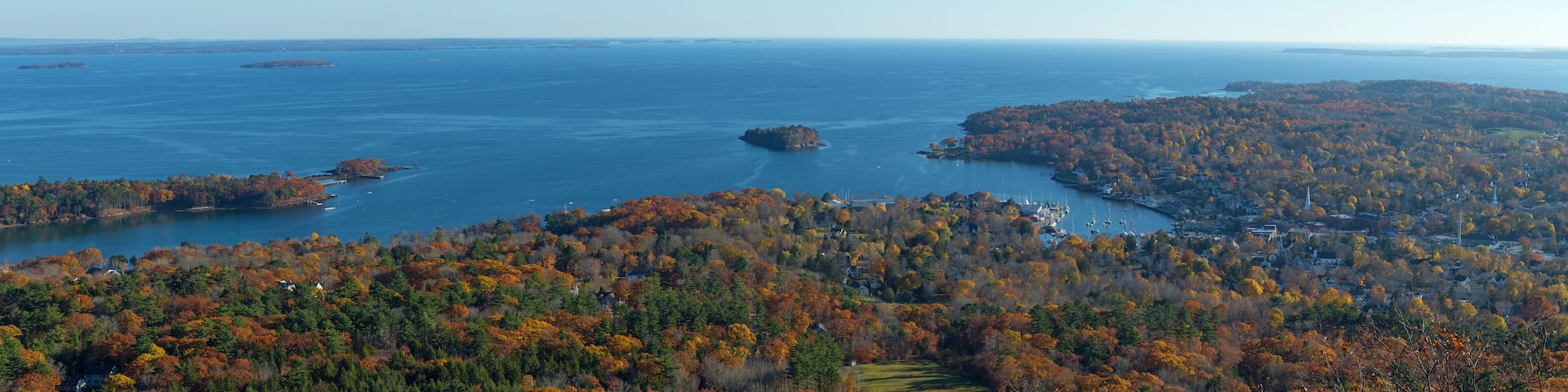 Town of Camden Maine in the late fall with Penobscot Bay and the horizon in the distance.