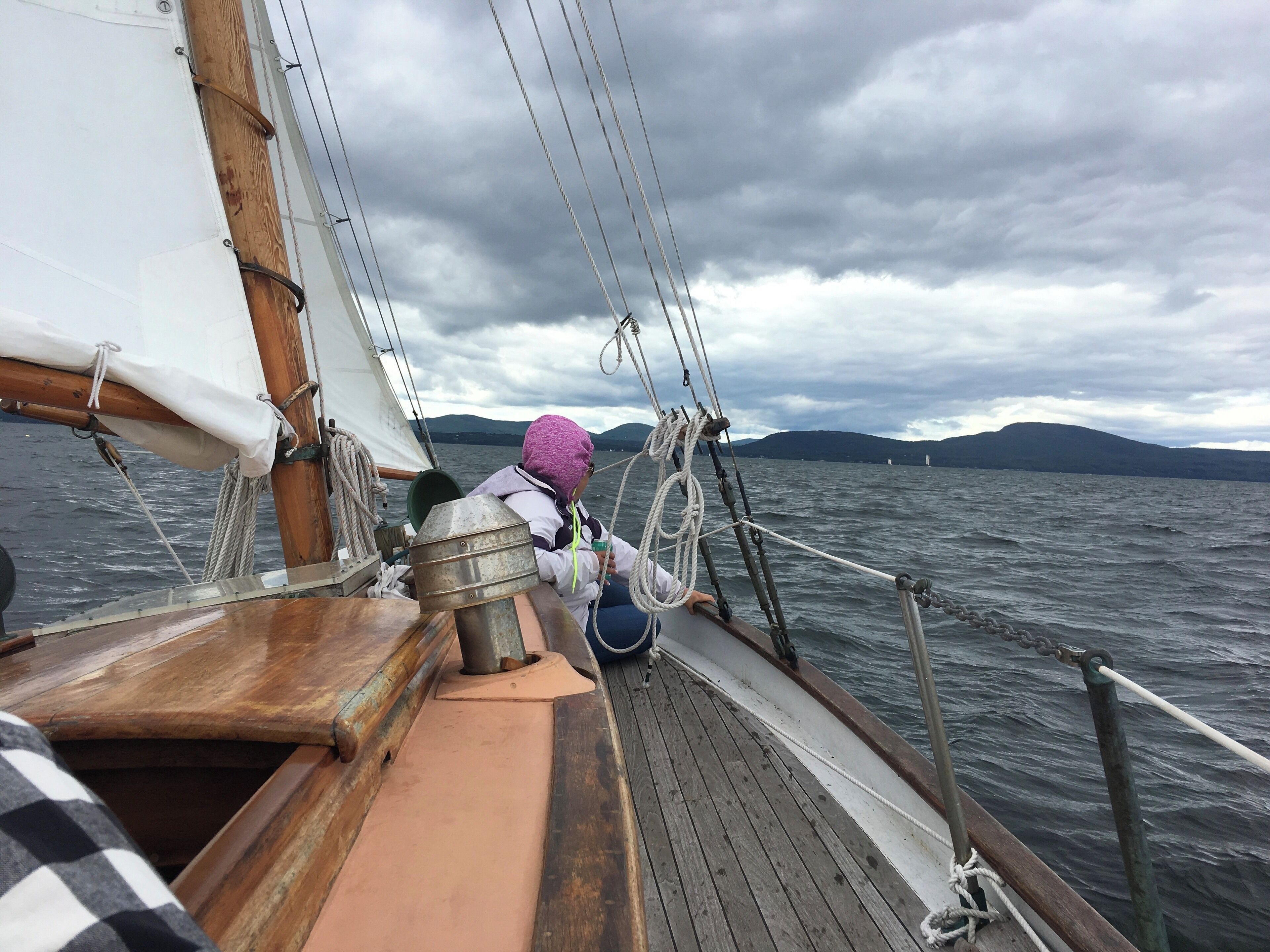Chartered a private wooden sailboat for 3 hrs.  Best part of our trip up and down the Maine Coast.  Camden is a nice protected harbor to sail out of but unlike the SW Coast of Lake Michigan, there are quite a few submerged and visible rocks to watch out for!  

It was a bit chili as you can see my wife all bundled up.  I of course had a sweatshirt on with shorts and my sandals 😎