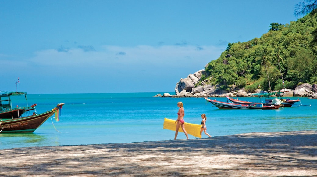 Ko Pha-ngan which includes tropical scenes, general coastal views and a beach