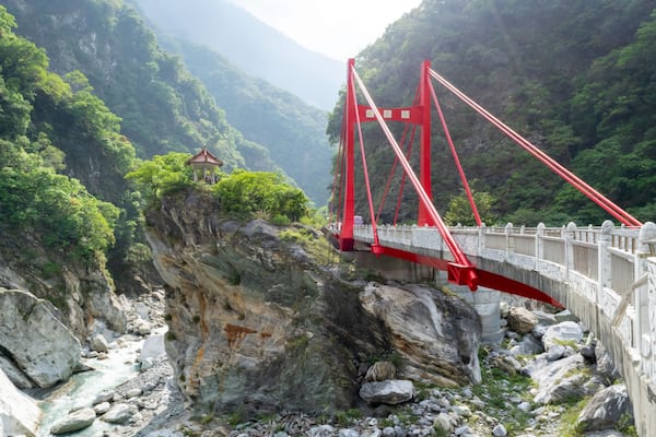 Red Bridge above Gorge and Chinese Temple Pagoda on Hill in Taroko National Park - Hualien County, Taiwan