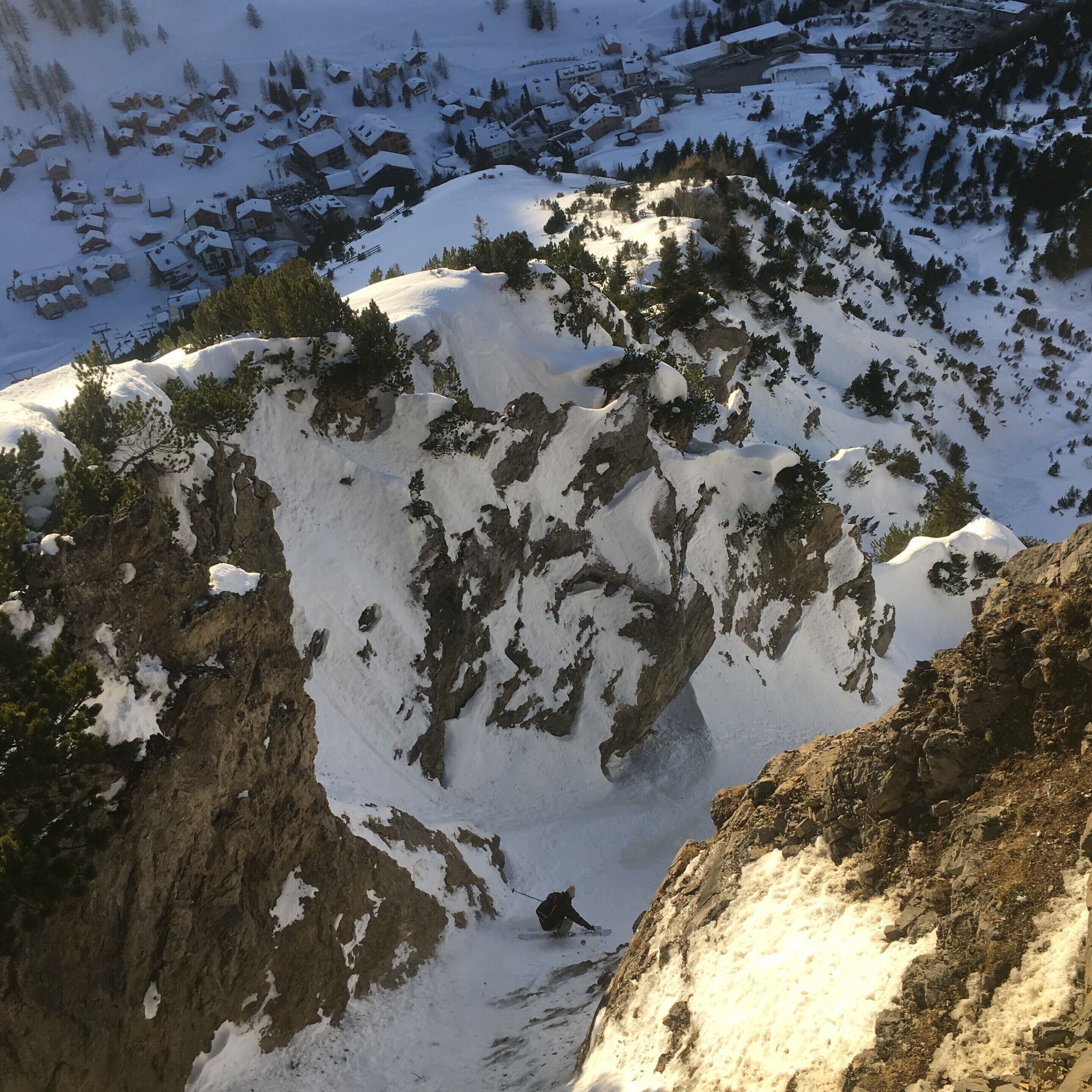 At first we didn't know if this couloir would be skiable, but after walking on the rocks to make sure it was a clear path we knew we had to ski it! With a magnificent view of the town below it was the perfect way to end the day as we skied into the shadowed valley below near sunset. Malbun is the only ski area in the small country of Liechtenstein.
