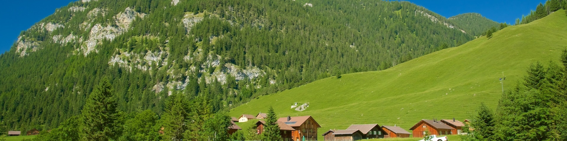 Malbun que incluye un pueblo, vistas panorámicas y un río o arroyo