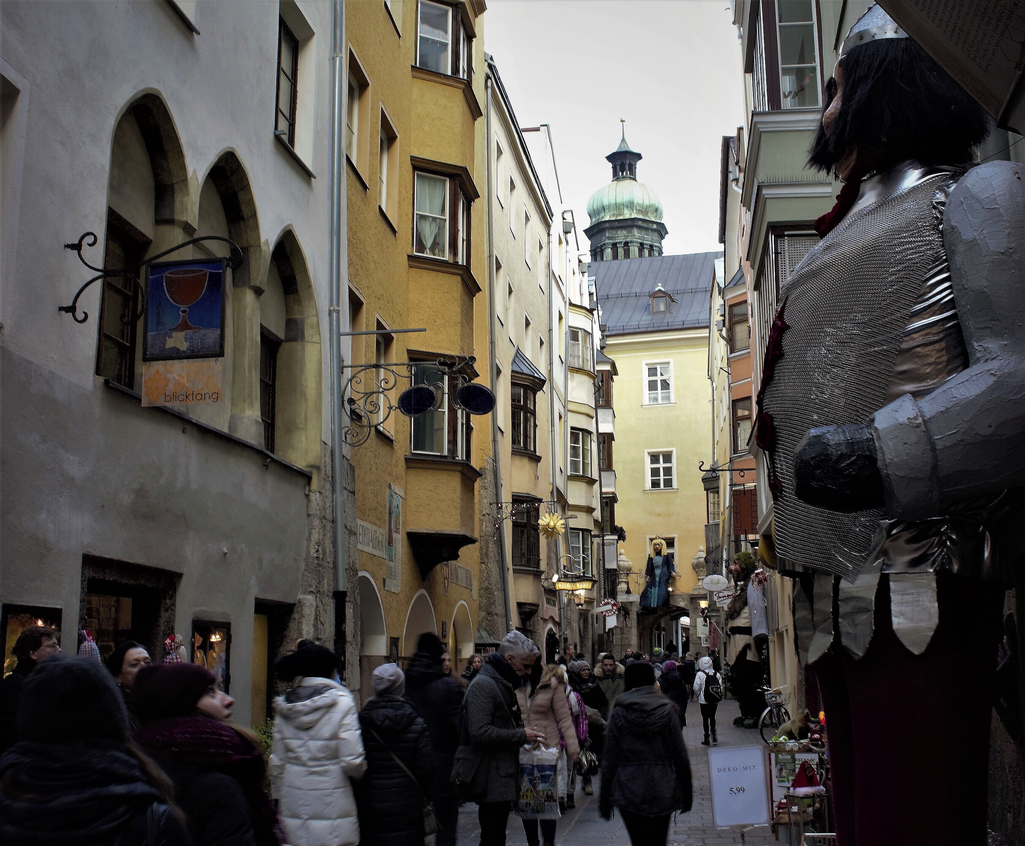 Giant dolls on the street at the Hofgasse, Innsbruck, Austria.