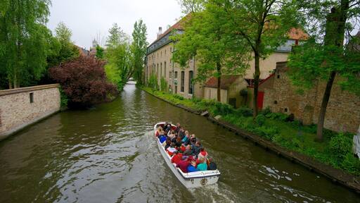 Flemish Region showing a river or creek and boating as well as a small group of people