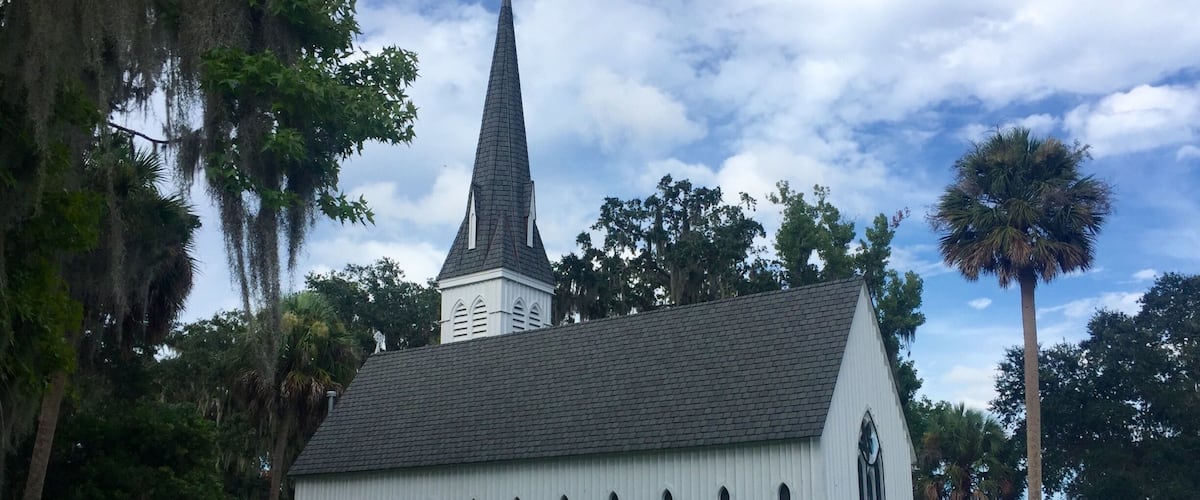 This church was organized in 1878. Beneath each window you will see a fire escape. Absolutely beautiful location on the St. John's River.