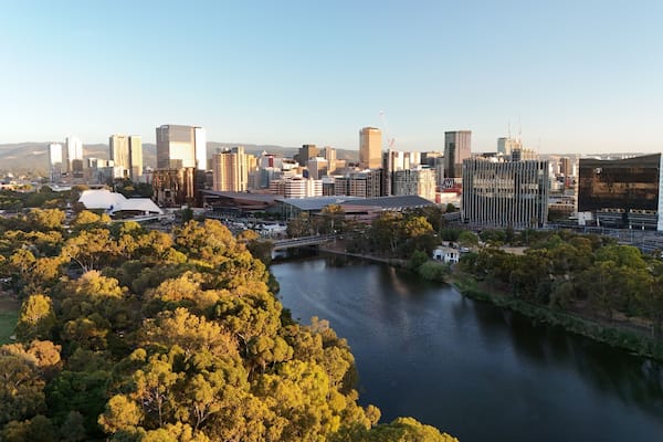 Adelaide City, South Australia – Aerial Drone View of City Skyline, CBD, urban landscape, River Torrens, Parklands, Adelaide Oval, Hospitals, University and North Adelaide at Sunset
