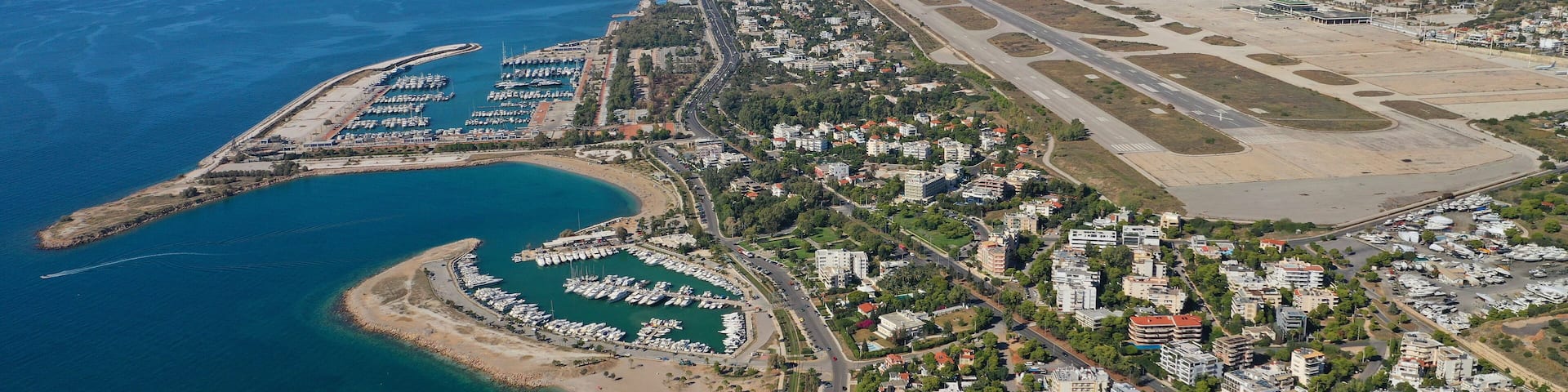 Aerial drone photo of Marina of Agios Kosmas and abandoned former international airport of Athens in Elliniko area, South Athens riviera, Attica, Greece