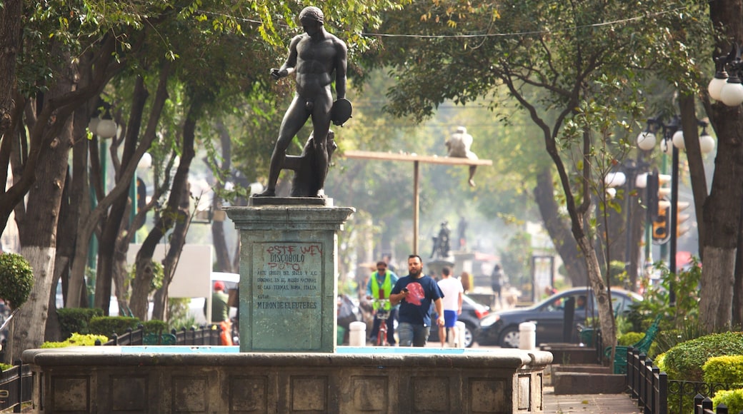 La Condesa which includes a fountain, a park and a statue or sculpture