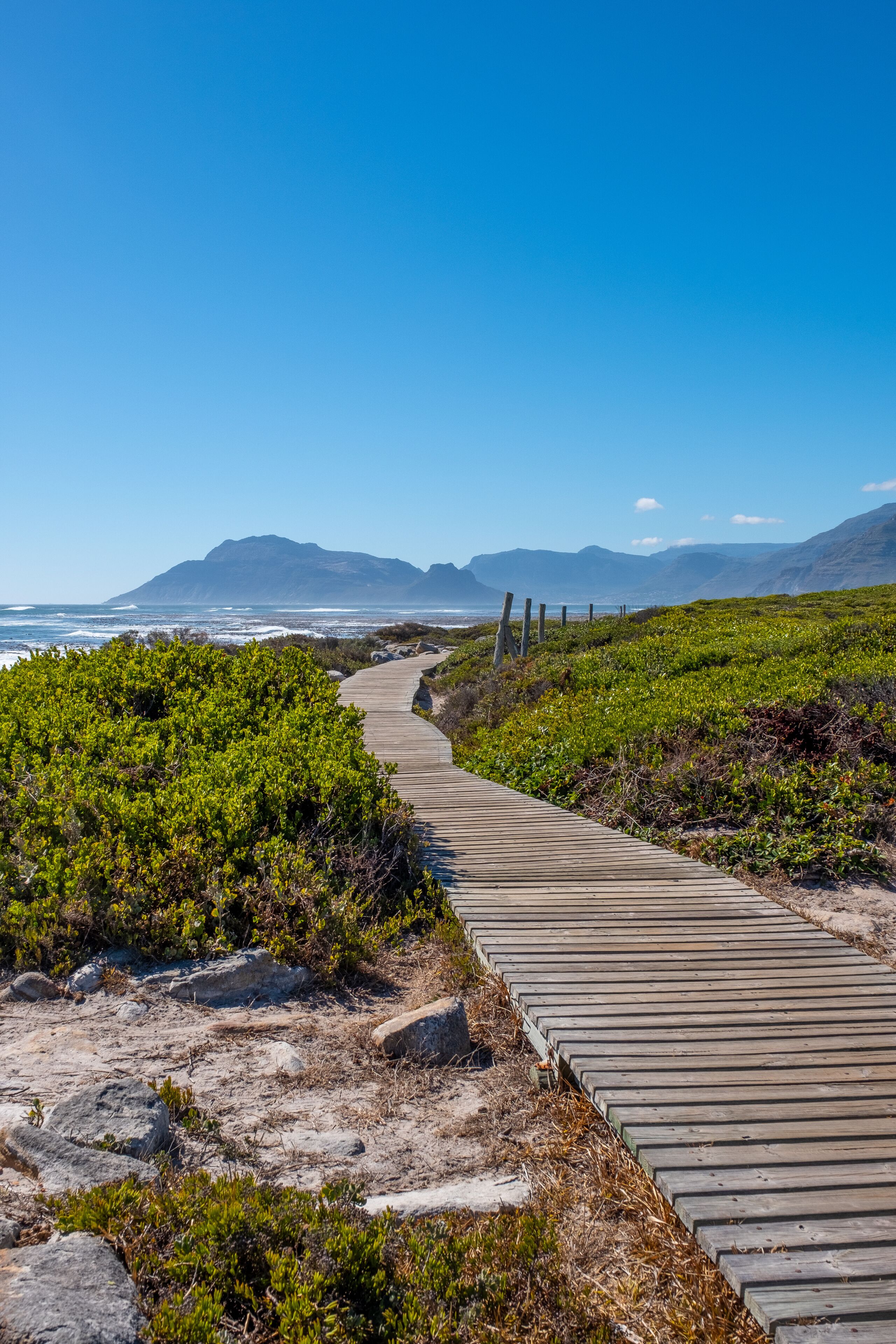 Hout Bay from a beach walkway in Kommitjie, Cape Town, south africa