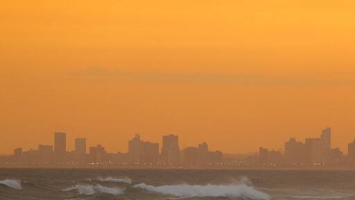Kwazulu-Natal showing a city, a high rise building and a sunset