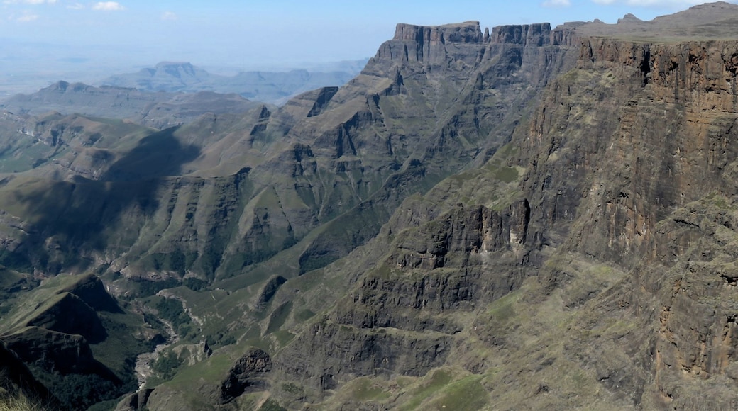 Mont-Aux-Sources is the highest area of the Drakensburg Mountains in South Africa. The name means Dragons Mountain. The views are unbelievable.
This picture is from the top of a section called the Amphitheater which is over 5 km in length and is a vertical wall of 300 meters. It has a flat plateau of that is about 3,050 meters high. It is regarded as one of the most impressive cliff faces on earth.
This area is reached by an amazing hike that includes a long, scary chain ladder that is a challenge to all hikers and too much for many.
There is also the incredible view of Tugela Falls, the second highest waterfall in the world, that falls about 3000 metres in five cascades.
Can you see the peak called 'Devils Tooth'? This peak and area appear twice in the Marvel Comic movie 'Black Panther'. Both times they return to Wakanda you see 'Devils Tooth' (12 & 134 minutes into the movie).
The area is also the source of the Tugela River and two tributaries of the Orange River, two important rivers in SA.