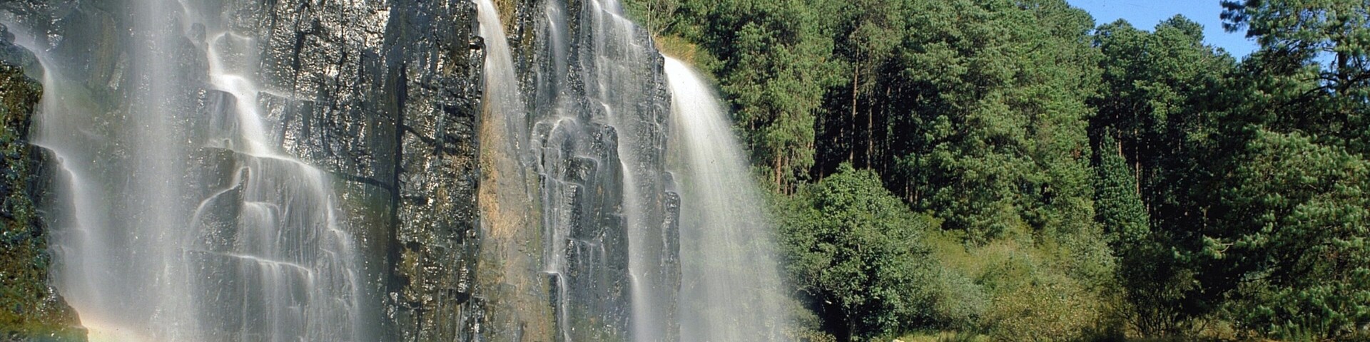 Mpumalanga - Limpopo showing a gorge or canyon, a waterfall and a lake or waterhole