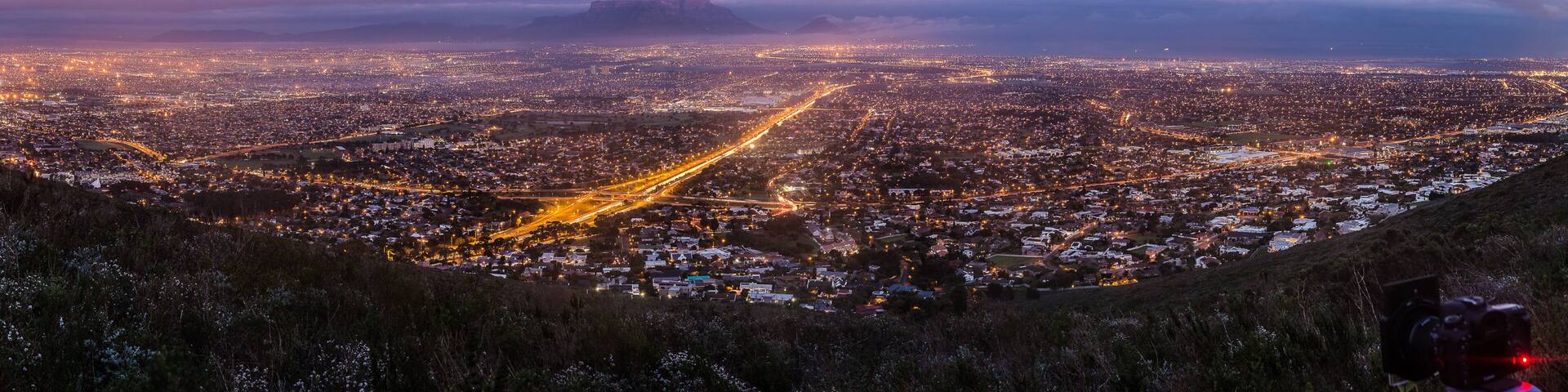 City scape over Cape Town South Africa at dawn, as seen from Tygerberg hill in the Northern Suburbs of Cape Town.