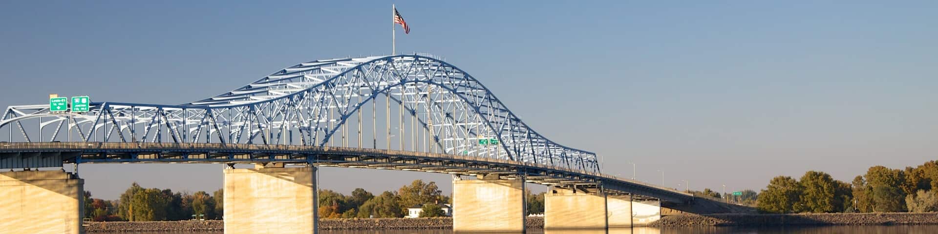 Tri-Cities featuring a river or creek and a bridge