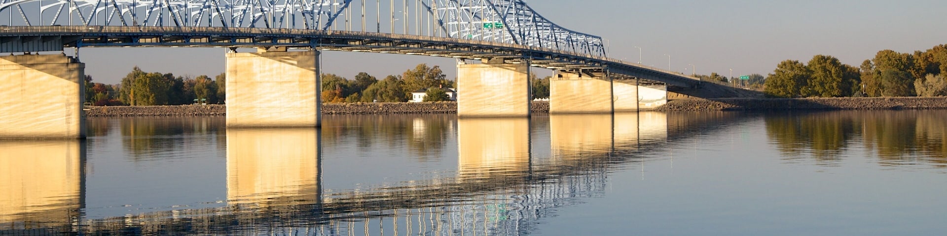 Tri-Cities featuring a river or creek and a bridge