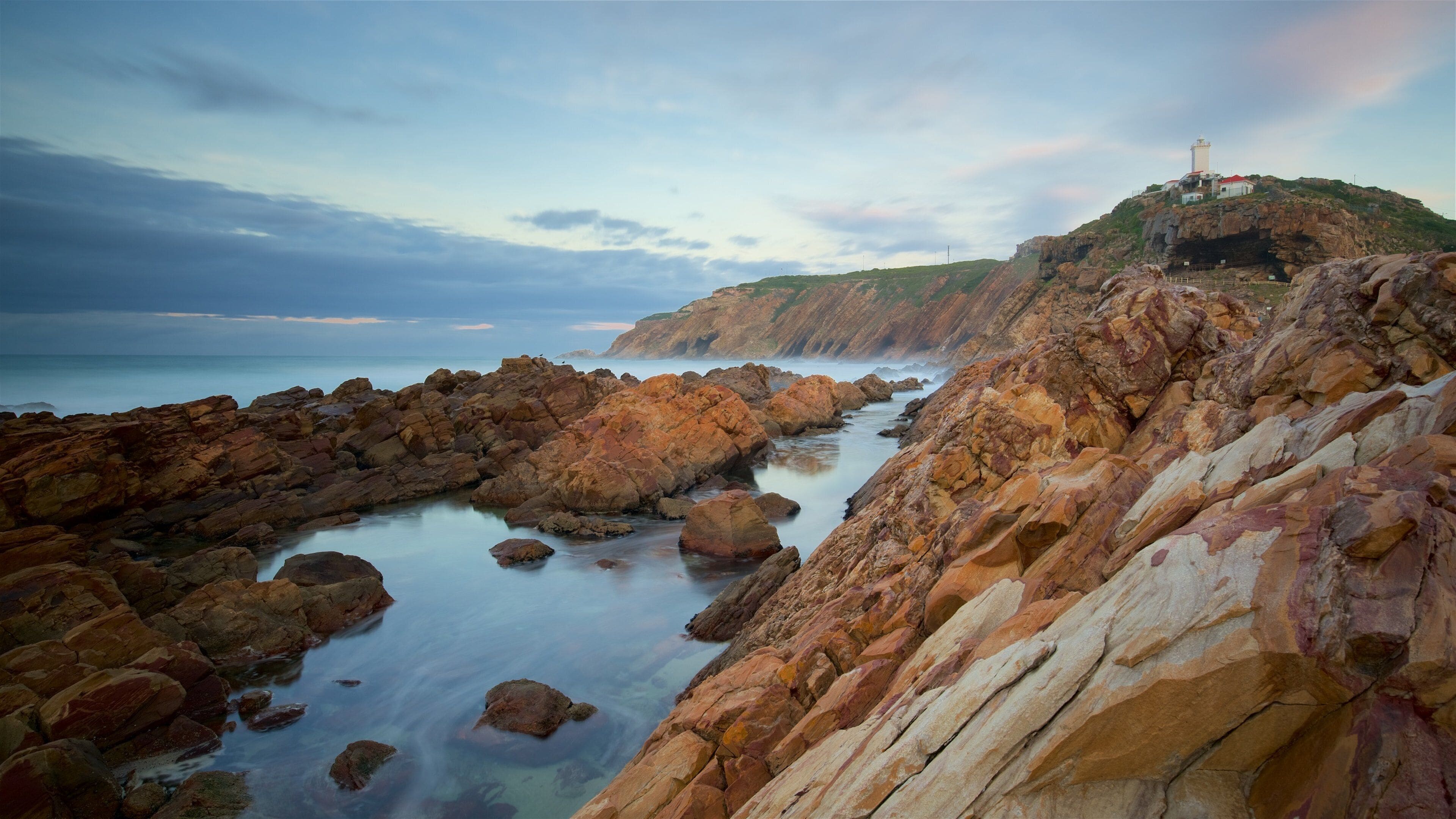 Garden Route showing a sunset, rugged coastline and general coastal views