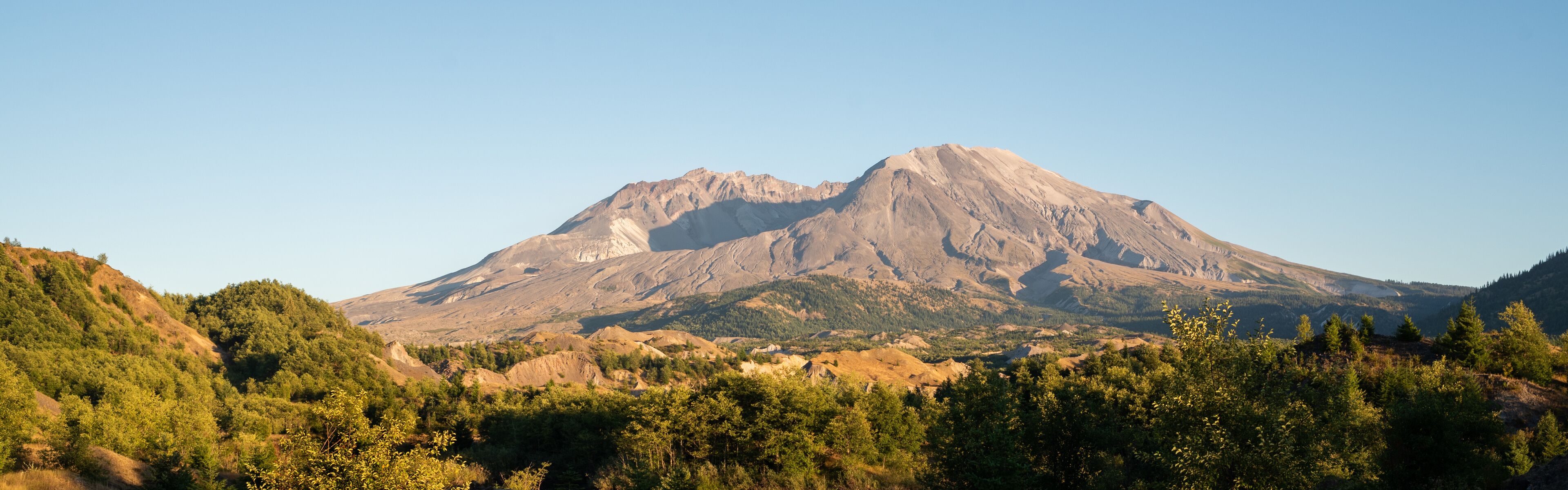 A mountain with a clear sky.
