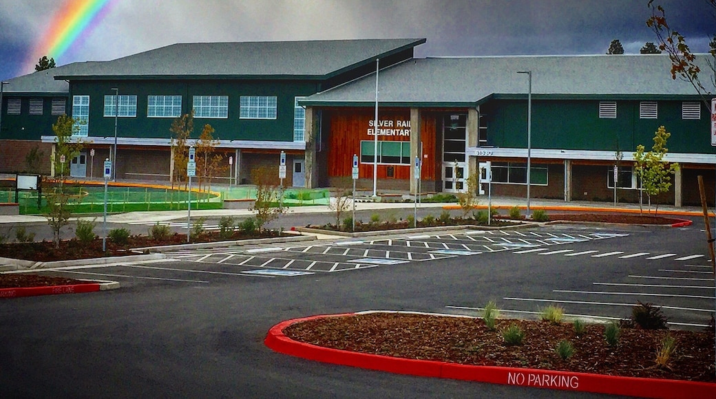 Beautiful rainbow over Silver Rail Elementary. This is a brand new school opening this year and the gorgeous rainbow was the perfect sign that it is going to be a great year! #colorful