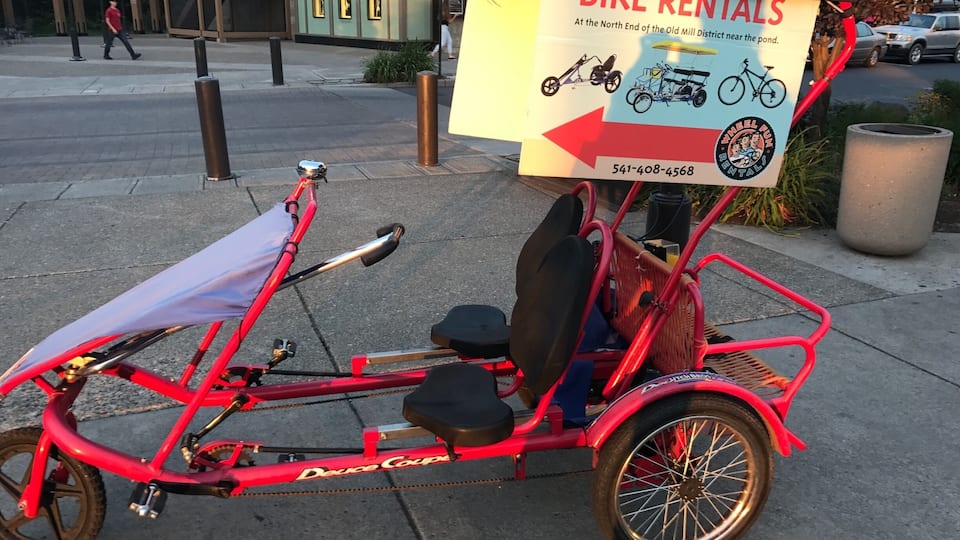 Just down the road from the movie theater are multiple bikes to rent