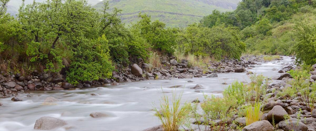 Drakensberg Mountains which includes a river or creek and landscape views